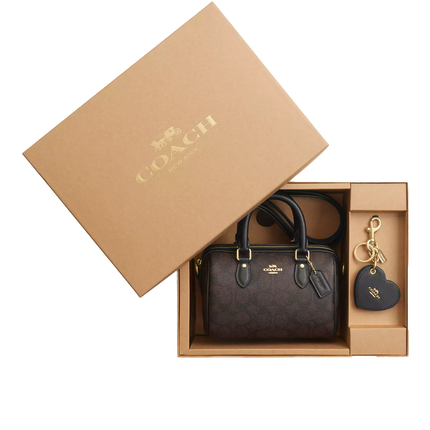 Coach Women's Boxed Mini Rowan Crossbody Bag And Mirror Bag Charm Set In Signature Canvas Gold/Walnut/Black - Hemen Kargoda