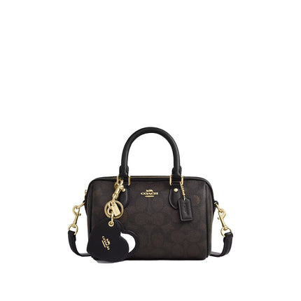 Coach Women's Boxed Mini Rowan Crossbody Bag And Mirror Bag Charm Set In Signature Canvas Gold/Walnut/Black - Hemen Kargoda