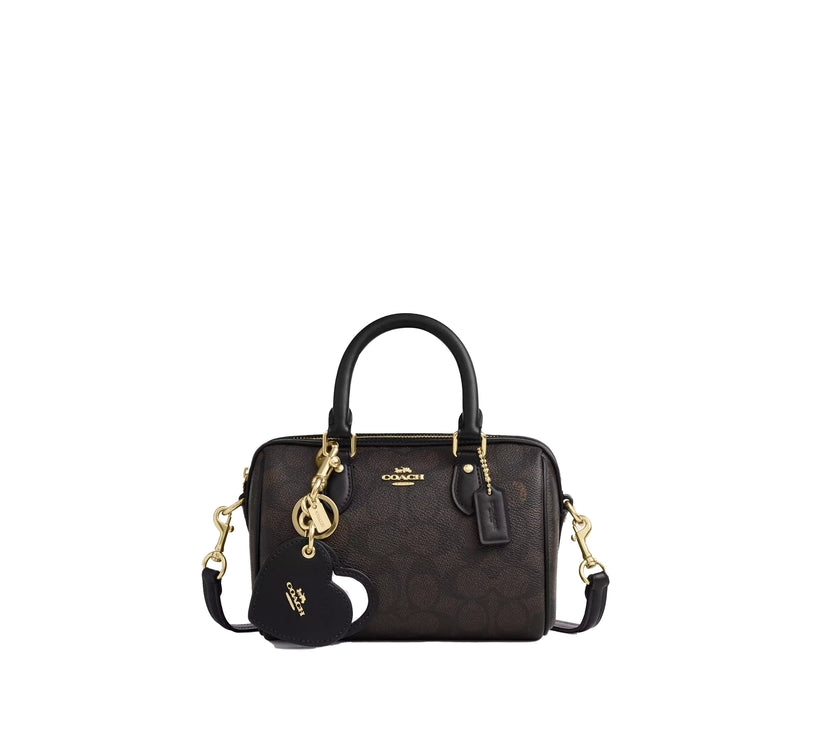 Coach Women's Boxed Mini Rowan Crossbody Bag And Mirror Bag Charm Set In Signature Canvas Gold/Walnut/Black - Hemen Kargoda